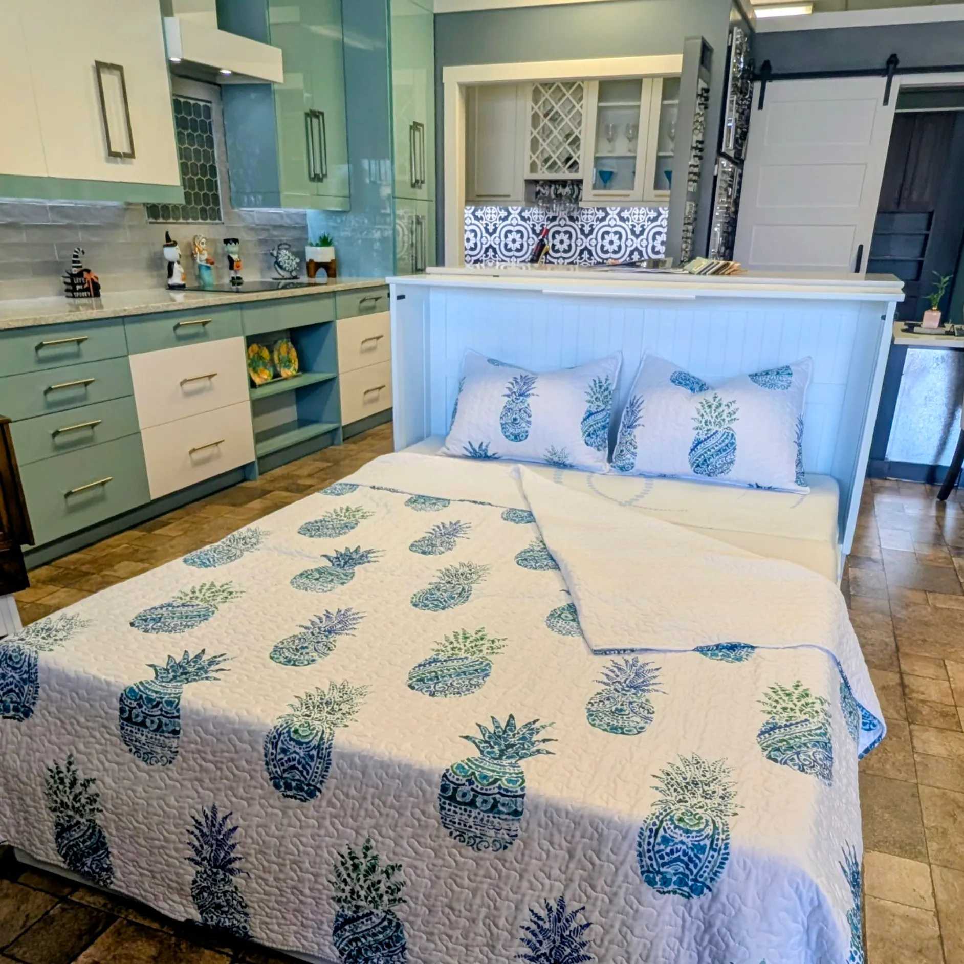 bed in front of custom cabinets